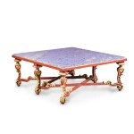 An Italian Baroque-style red painted and parcel-gilt low table, 20th century