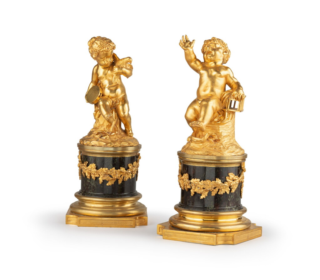 View full screen - View 1 of Lot 50. A pair of Louis XVI gilt bronze and serpentine marble figural groups | Paire de groupes en bronze doré et marbre serpentine d'époque Louis XVI.