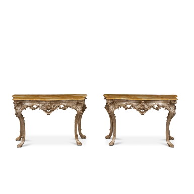 View full screen - View 1 of Lot 569. A Pair of Neapolitan Rococo Silvered Wood Console Tables, Mid-18th Century .