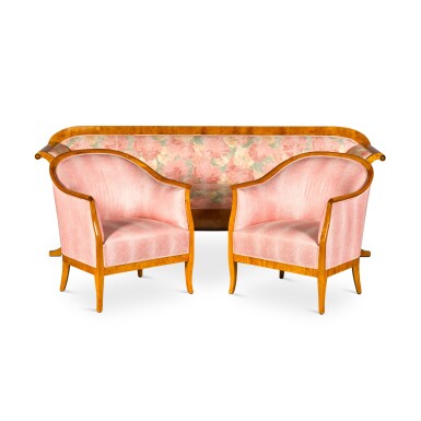 View full screen - View 1 of Lot 702. A Biedermeier style satinbirch and rosewood sofa and maple armchairs.