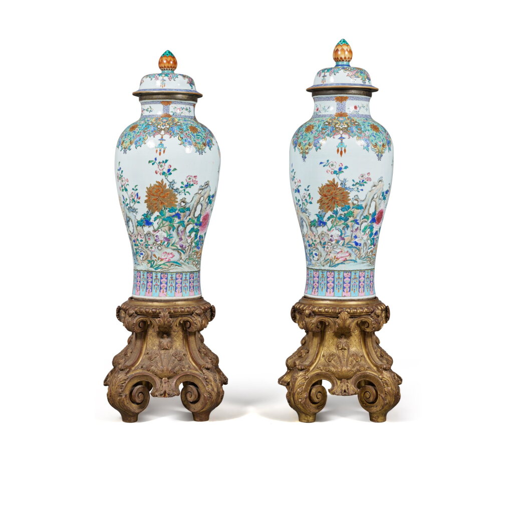View full screen - View 1 of Lot 89. An Impressive and Rare Pair of Chinese Famille-Rose 'Soldier' Vases and Covers, Qing Dynasty, Qianlong Period, Circa 1740 | 清乾隆 約1740年 粉彩花卉庭院圖大蓋瓶一對.