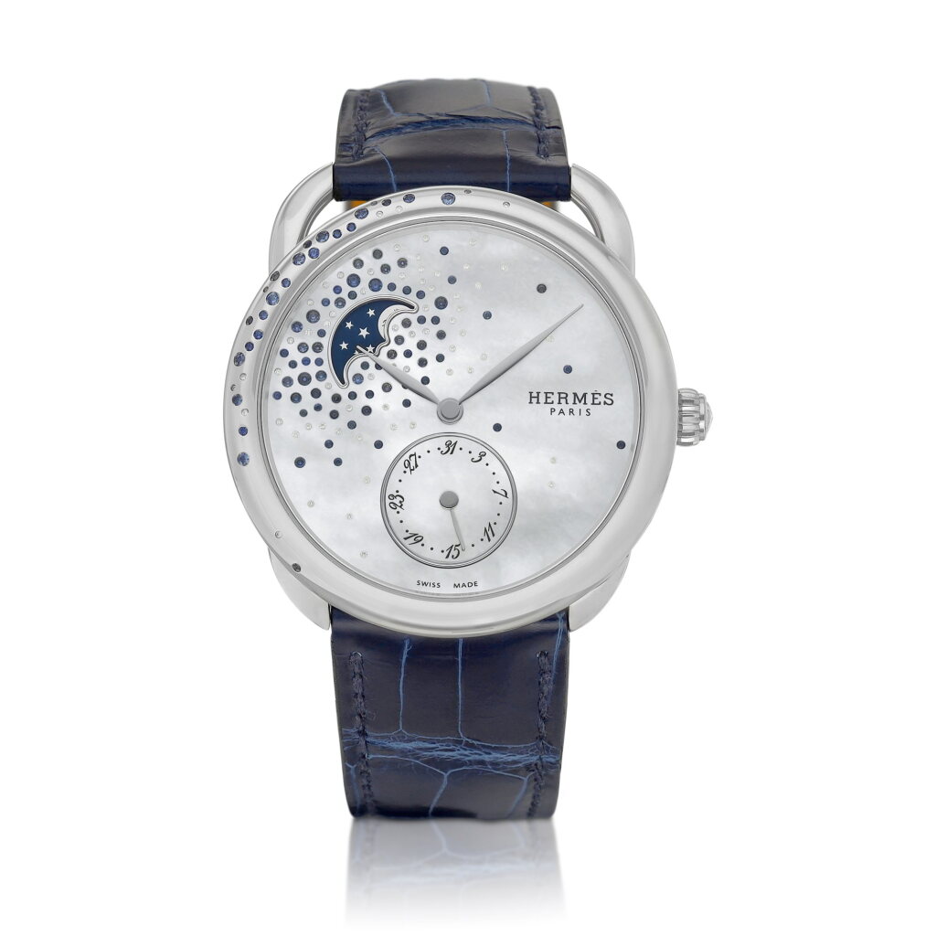 View full screen - View 1 of Lot 8862. Arceau Petite Lune, Reference AR7.A30 | A stainless steel, diamond and sapphire-set wristwatch with date, moon phases and mother-of-pearl dial, Circa 2021 | 愛馬 | 仕 Arceau Petite Lune 型號AR7.A30 | 精鋼鑲鑽石及藍寶石腕錶,備日期、月相顯示及珠母貝錶盤,約2021年製.