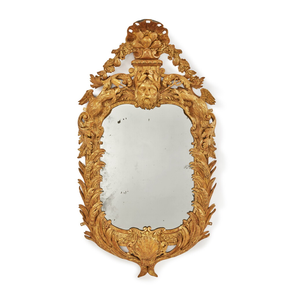 View full screen - View 1 of Lot 1241. A George II Giltwood Mirror attributed to Matthias Lock, Circa 1740.