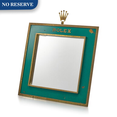 View full screen - View 1 of Lot 8016. ROLEX | A GILT BRASS AND GREEN ENAMEL RETAILER'S DISPLAY MIRROR WITH WOODEN BACK, CIRCA 1960.