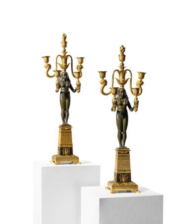 View full screen - View 1 of Lot 176. A pair of gilt and patinated bronze five-light candelabra 'aux Égyptiennes', probably England, first quarter of the 19th century.