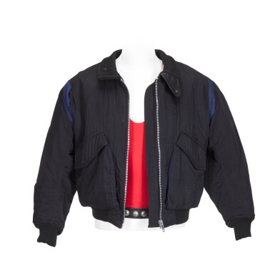 View full screen - View 1 of Lot 218. Freddie Mercury’s party-worn red vest, jacket and belt, 1980s.