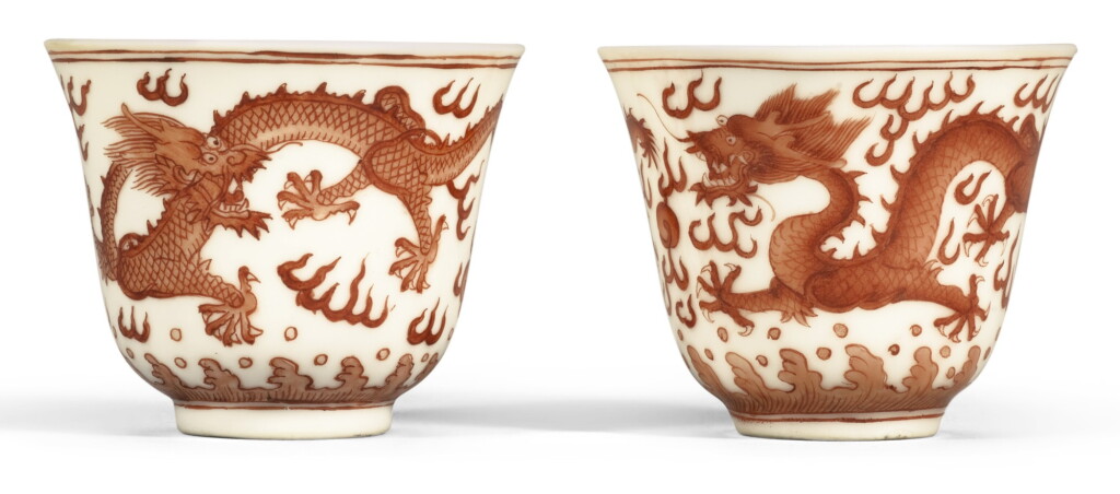 View full screen - View 1 of Lot 161. A PAIR OF IRON-RED 'DRAGON' CUPS GUANGXU MARKS AND PERIOD | 清光緒 礬紅彩雲龍戲珠紋盃一對 《大清光緒年製》款.