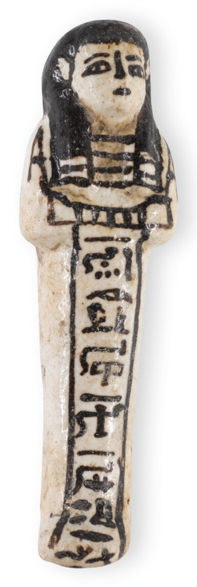 View full screen - View 1 of Lot 71. AN EGYPTIAN GLAZED FAIENCE USHABTI, 19TH/20TH DYNASTY, CIRCA 1292-1075 B.C..