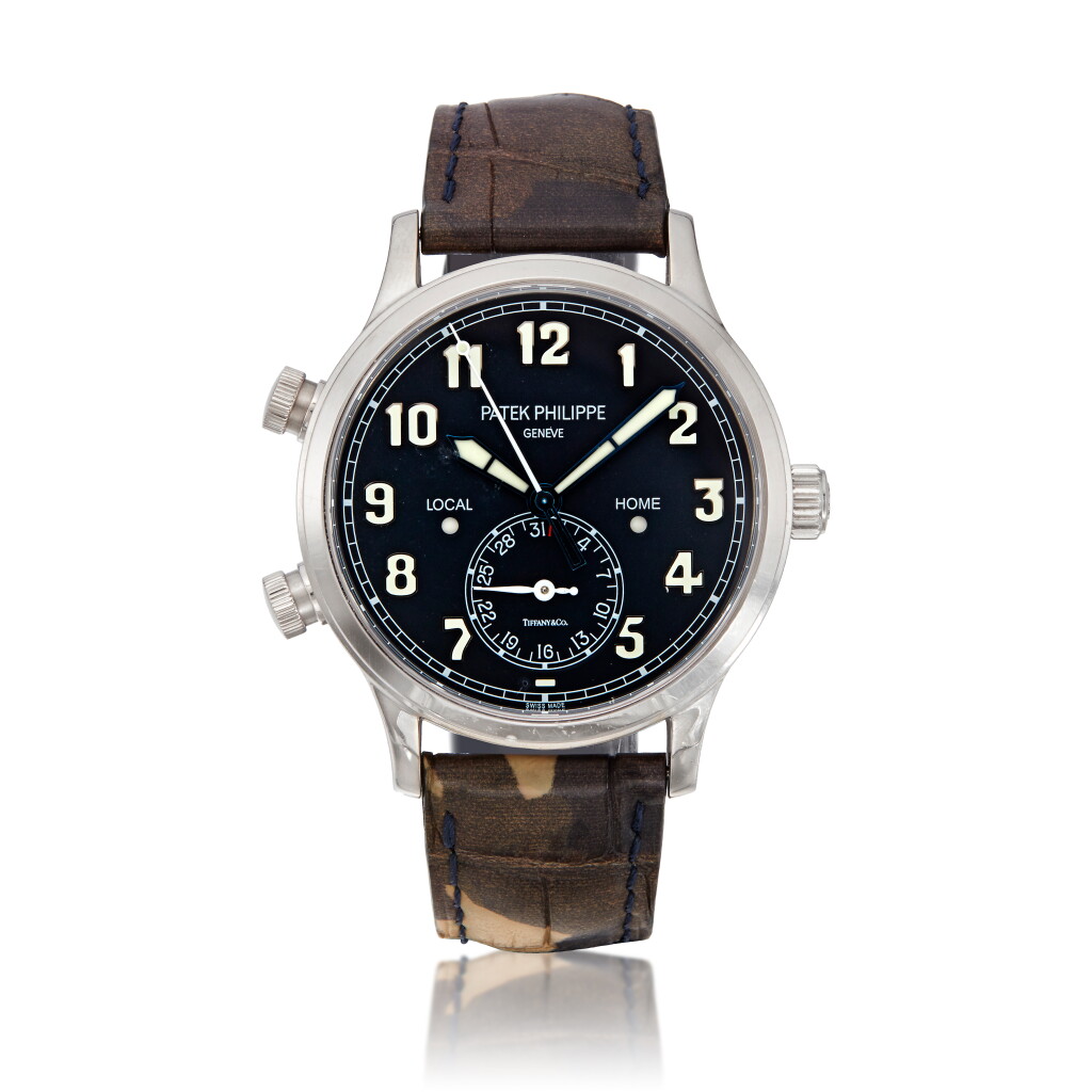 View full screen - View 1 of Lot 24. Reference 5524G-001 Calatrava Pilot Travel Time, Retailed by Tiffany & Co.: A white gold automatic dual time wristwatch with date, Circa 2017 百達翡麗 5524G-001型號 Calatrava Pilot Travel Time 白金自動上鏈兩地時間腕錶備日期顯示,約2017年製,零售商為蒂芙尼.