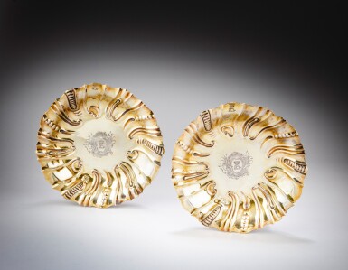 View full screen - View 1 of Lot 427. A pair of circular silver-gilt deep dishes, Thomas Heming, London, 1766 | Paire de jattes rondes en vermeil par Thomas Heming, Londres, 1766.