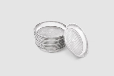 View full screen - View 1 of Lot 42. A SET OF TWELVE AMERICAN SILVER COASTERS | TIFFANY & CO., NEW YORK | CIRCA 1930'S.