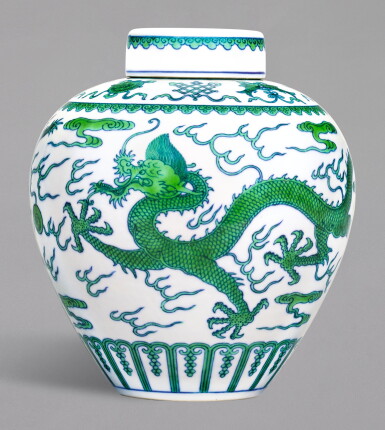 View full screen - View 1 of Lot 33. A GREEN-ENAMELLED 'DRAGON' JAR AND COVER, QIANLONG SEAL MARK AND PERIOD | 清乾隆 白地綠彩雲龍趕珠紋蓋罐 《大清乾隆年製》款.