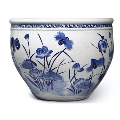 View full screen - View 1 of Lot 78. A large blue and white 'lotus pond' jardinière, Qing dynasty, 18th century | 清十八世紀 青花浮雕路路連科圖大缸.