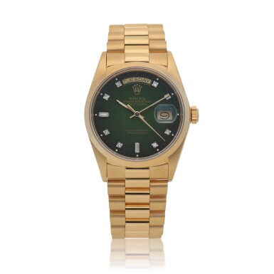 View full screen - View 1 of Lot 68. Day-Date, Ref. 18028, Yellow gold and diamond-set wristwatch with day, date, bracelet and dégradé dial Circa 1987 | 勞力士 | 18028型號「Day-Date」黃金鑲鑽石鍊帶腕錶備星期及日期顯示,約1987年製.