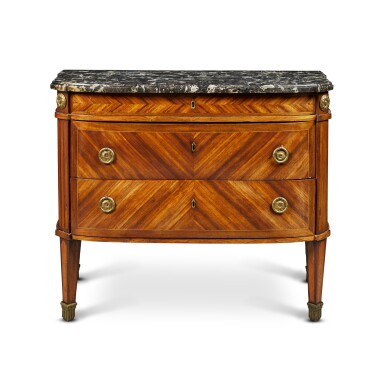 View full screen - View 1 of Lot 64. A Louis XVI Gilt-Bronze Mounted Amaranth and Bois Satiné Commode, Stamped J.F. Leleu JME, Circa 1780.