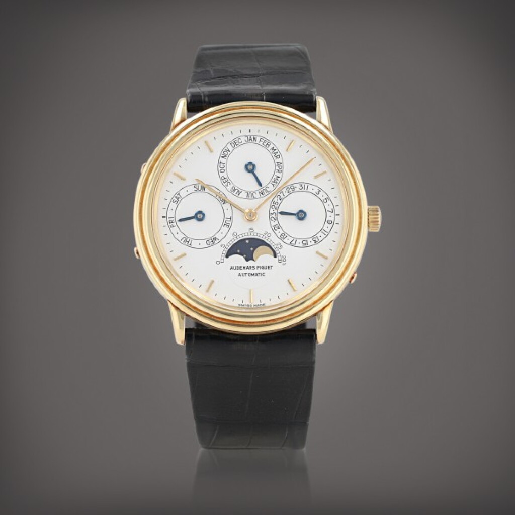 View full screen - View 1 of Lot 115. Montre bracelet en or jaune avec quantième perpétuel et phases de lune | Yellow gold perpetual calendar wristwatch with moon phases Vers 1980 | Circa 1980.