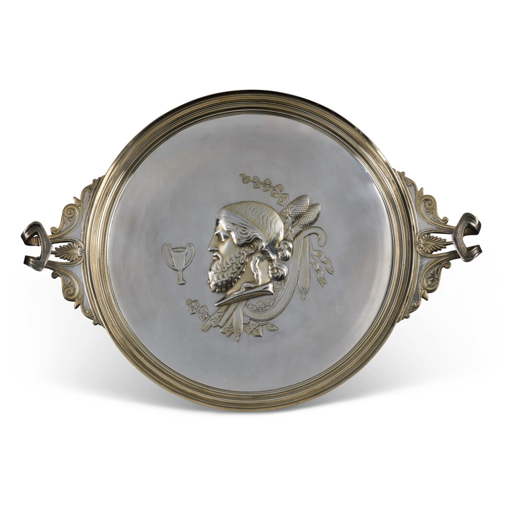 View full screen - View 1 of Lot 94. A FRENCH GILT AND SILVERED BRONZE TWO-HANDLED TAZZA, BY FERDINAND LEVILLAIN, CIRCA 1880 .
