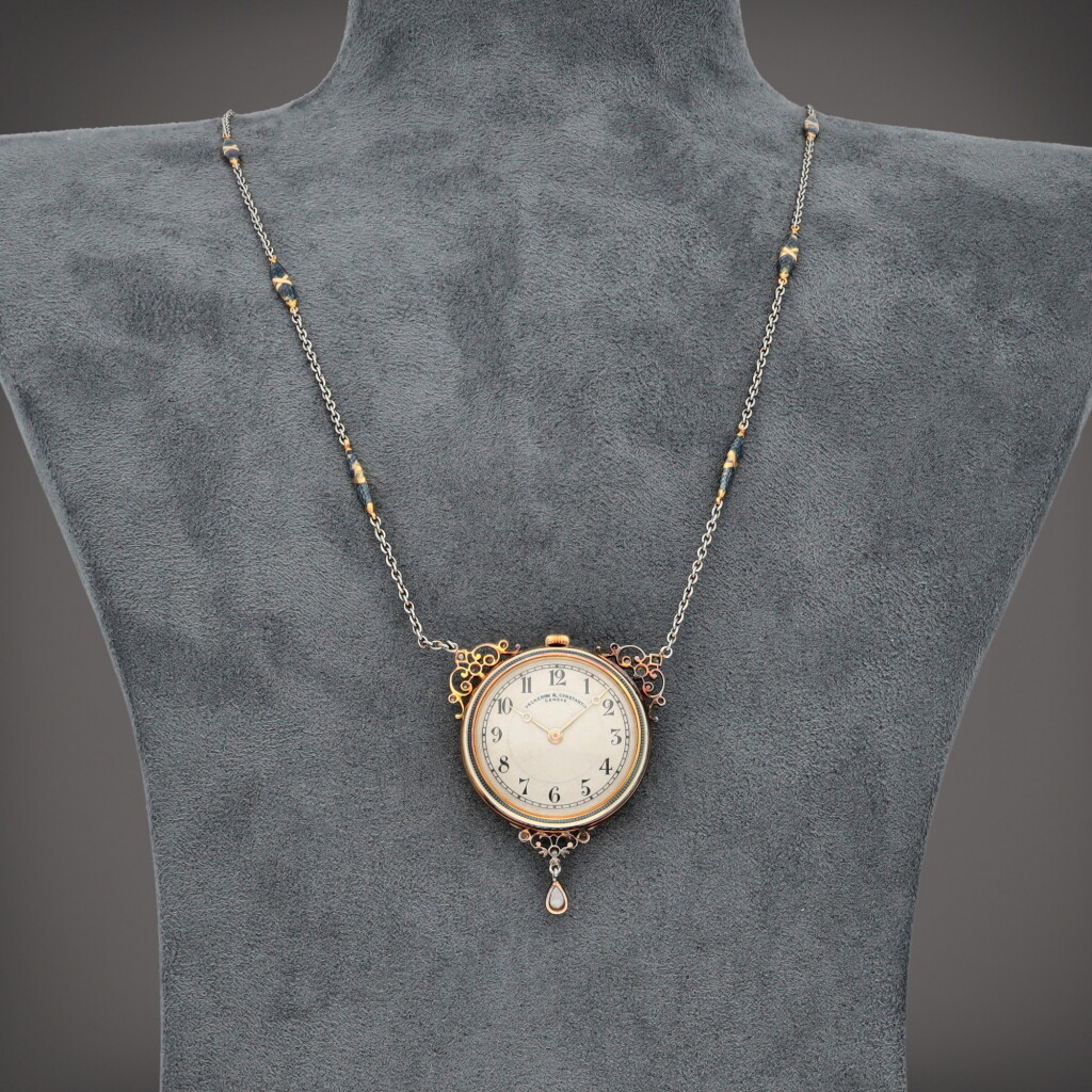 View full screen - View 1 of Lot 294. A yellow gold, platinum and diamond-set enamel pendant watch | Made in 1910.