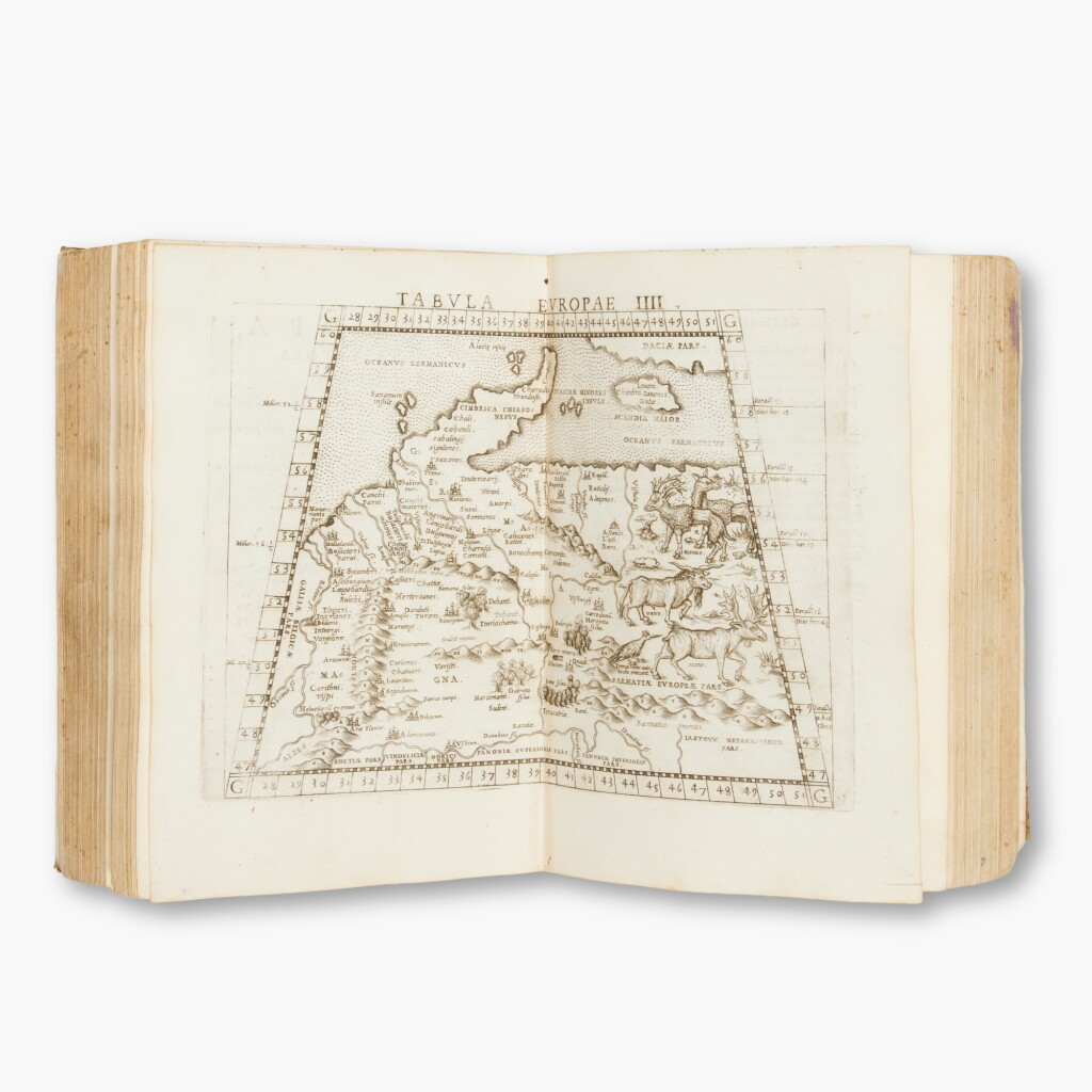 View full screen - View 1 of Lot 18. Ptolemaeus, Claudius | La geografia, with Discorso universale by G. Moleto, Venice, 1561, contemporary limp vellum.
