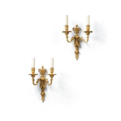 View full screen - View 1 of Lot 751. A pair of Louis XVI gilt-bronze two-light wall-lights, circa 1780 .