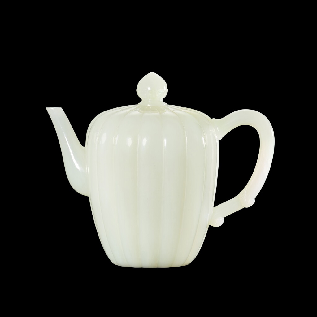 View full screen - View 1 of Lot 3647. A superbly carved and exceedingly fine white jade 'lotus' fluted teapot and cover Qing dynasty, Qianlong period | 清乾隆 白玉寶蓮茶壺.