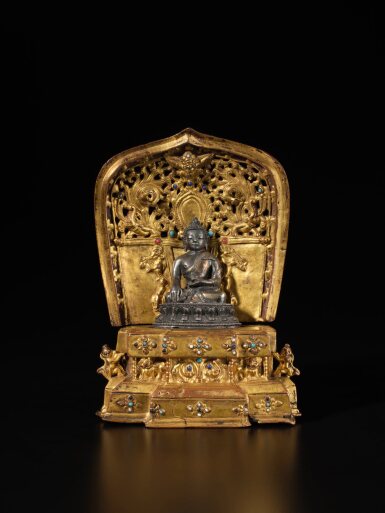 View full screen - View 1 of Lot 125. A gilt copper alloy throne, Tibet, 14th century | 西藏 十四世紀 銅合金鎏金嵌寶寶座.