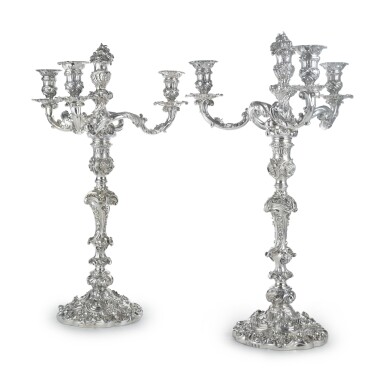 View full screen - View 1 of Lot 180. A Pair of George IV Silver Large Three- or Four-Light Candelabra, bases by Joseph Craddock, branches by R. & S. Garrard, London, 1825-6.