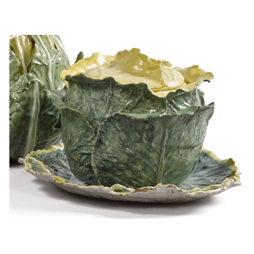View full screen - View 1 of Lot 224. A CONTINENTAL FAIENCE CABBAGE TUREEN, COVER AND A STAND, LATE 18TH CENTURY.