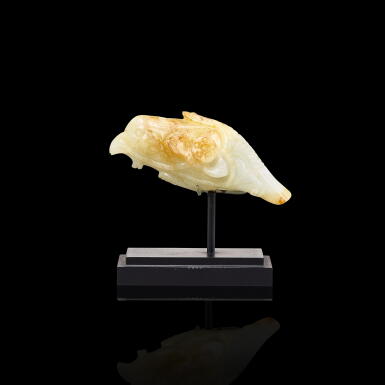 View full screen - View 1 of Lot 191. A russet and celadon jade figure of a bird, Song dynasty | 宋 褐斑青白玉瑞鳥銜蓮擺件.