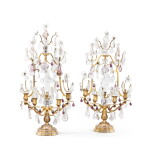 A pair of Louis XV style four-light gilt-bronze girandoles, 19th century | Paire de girandoles en bronze ciselé et doré à quatre bras de lumière de style Louis XV, XIXe siècle