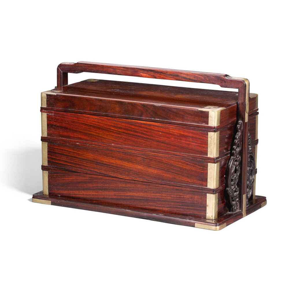 View full screen - View 1 of Lot 314. A HONGMU THREE-TIERED PICNIC BOX, QING DYNASTY, 19TH CENTURY | 清十九世紀 紅木三層提盒.