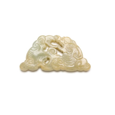 View full screen - View 1 of Lot 217. A PALE CREAM AND CELADON JADE 'DRAGON' PENDANT, 17TH/18TH CENTURY | 十七/十八世紀 青玉龍紋珮.
