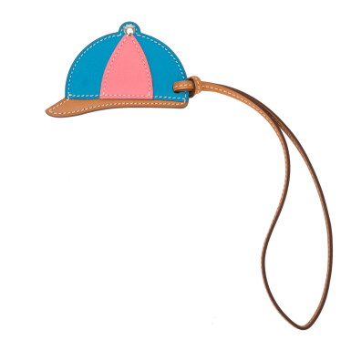 View full screen - View 1 of Lot 21. Hermès Paddock "Bombe" Helmet Leather Bag Charm of Bleu Zanzibar, Rose Azalee and Sable Swift and Butler Leather PM.