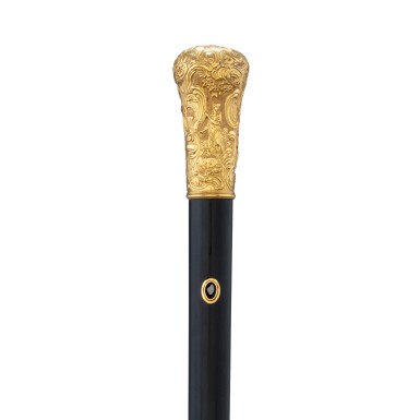 View full screen - View 1 of Lot 56. A Louis XV style cane with gold knob, France, circa 1890 | Canne à pommeau en or de style Louis XV, France, vers 1890.