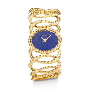 View full screen - View 1 of Lot 98. PIAGET | REFERENCE 9850 D65, A YELLOW GOLD BRACELET WATCH WITH LAPIS LAZULI DIAL, CIRCA 1970.