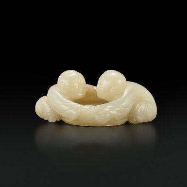View full screen - View 1 of Lot 3686. A white and russet jade 'boy and drum' group, Ming dynasty | 明 白玉擊鼓童子.