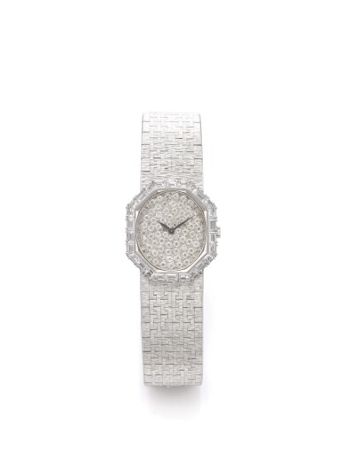 View full screen - View 1 of Lot 172. PIAGET | REF 93413 B2, A WHITE GOLD AND DIAMOND SET BRACELET WATCH CIRCA 1985.