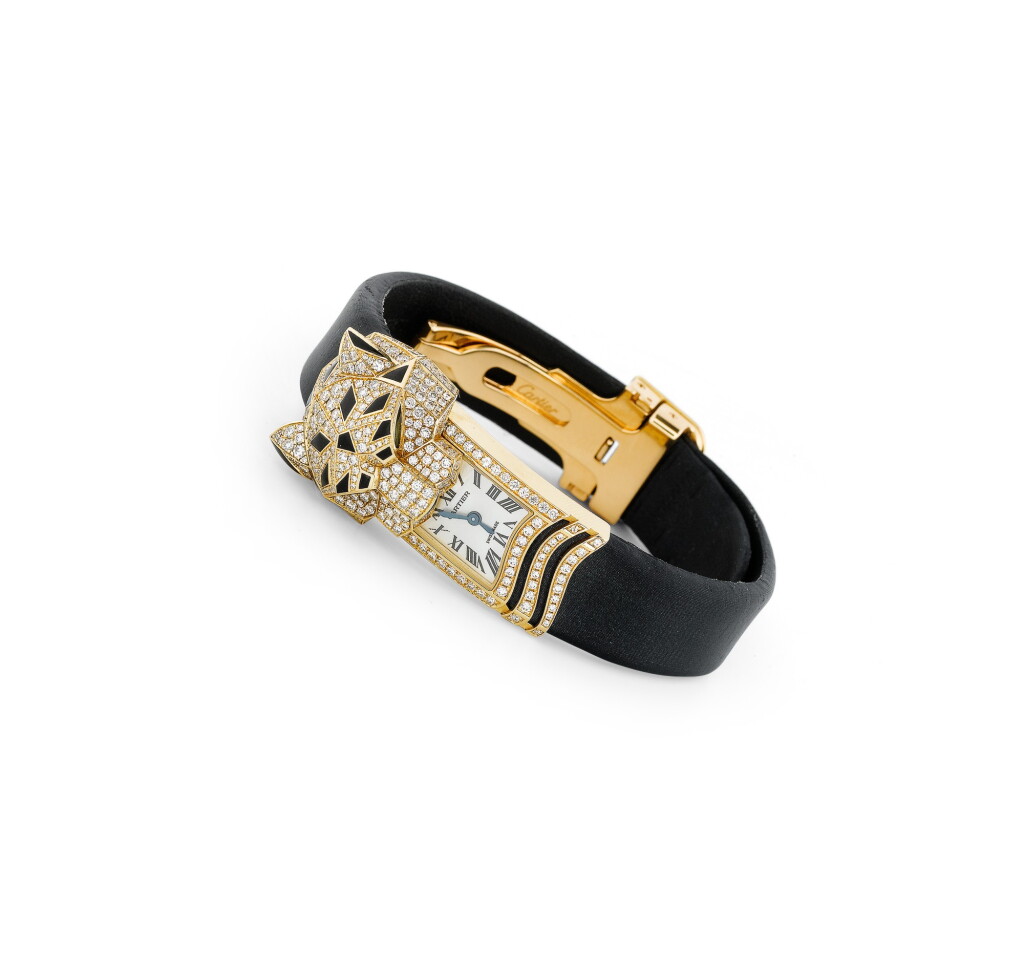 View full screen - View 1 of Lot 198. Montre bracelet de dame onyx et diamants, "Panthère secrète" | Lady's onyx and diamond wristwatch, 'Panthère secrète'.