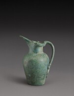 An Etruscan Bronze Oinochoe, circa early 5th century B.C.