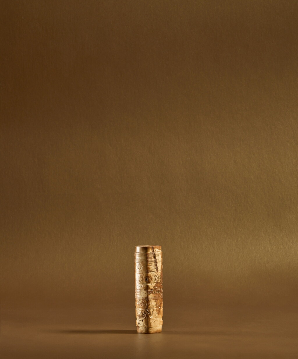 View full screen - View 1 of Lot 99. An archaic jade ‘mask’ bead, Neolithic period, Liangzhu culture .