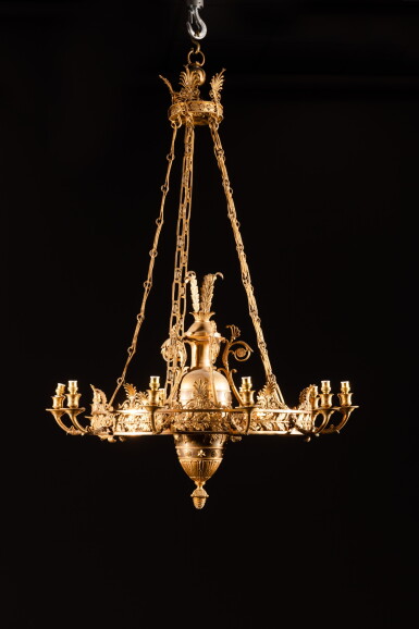 View full screen - View 1 of Lot 303. An Empire gilt-bronze ten-light chandelier attributed to Pierre-Philippe Thomire, circa 1810 | Lustre à dix lumières en bronze doré d'époque Empire attribué à Pierre-Philippe Thomire, vers 1810.