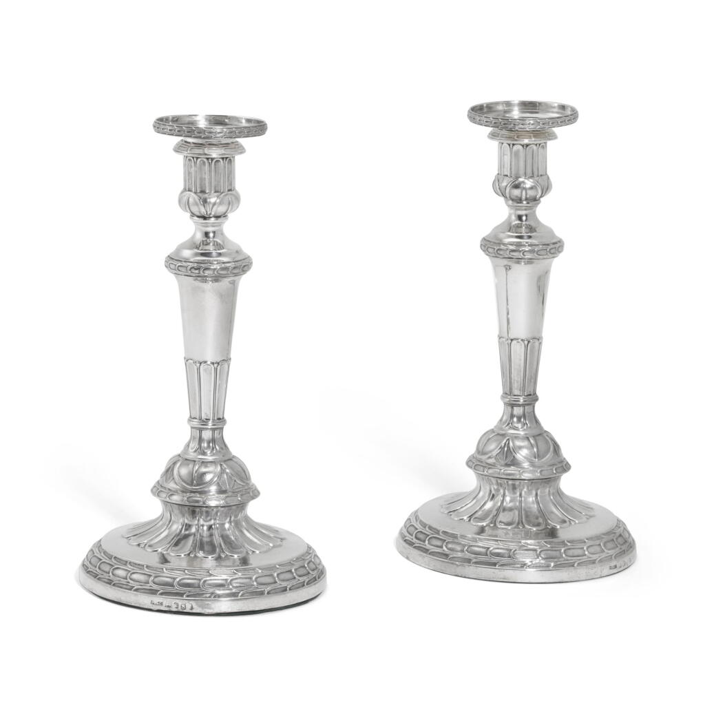 View full screen - View 1 of Lot 111. A pair of George III large silver candlesticks, John Roberts & Co., Sheffield 1807.