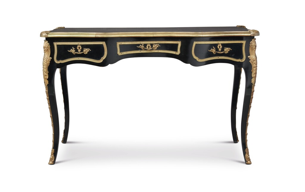 View full screen - View 1 of Lot 254. A LOUIS XV STYLE GILT BRONZE-MOUNTED EBONIZED BUREAU PLAT.