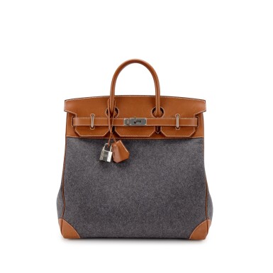 View full screen - View 1 of Lot 110. Gris Moyen Feutre Wool and Barenia Haut à Courroies HAC Birkin Palladium Hardware, 2018.