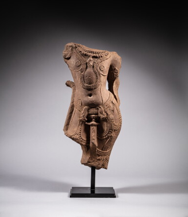View full screen - View 1 of Lot 126. A sandstone torso of a deity, India, Madhya-Pradesh, 10th - 11th century | 印度中央邦 十至十一世紀 砂岩雕神立像殘件.