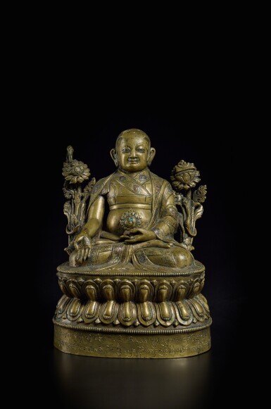 View full screen - View 1 of Lot 816. An inscribed silver and copper inlaid copper alloy figure of Lowo Khenchen Sonam Lhundrup, Tibet, 16th century.