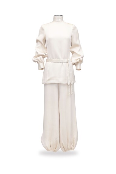 View full screen - View 1 of Lot 55. Roberto Capucci, Haute Couture, circa 1969, High collar blouse, matching belt, and harem pants | Ensemble blouse et pantalon bouffant en satin et ceinture.