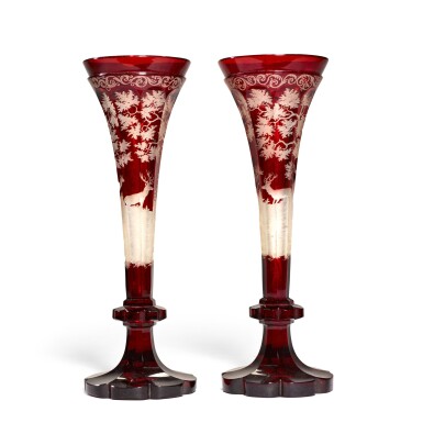 View full screen - View 1 of Lot 134. A pair of Bohemian ruby-stained and engraved glass trumpet vases, late 19th century.