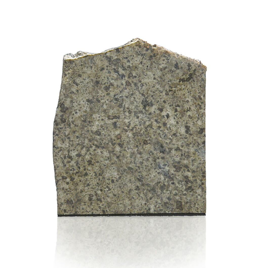 View full screen - View 1 of Lot 109. A PARTIAL SLICE OF THE MARTIAN METEORITE NWA 8716 (“JRIFIYA”).