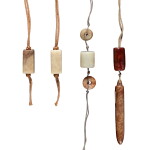 A group of seven jade beads and toggles, Han dynasty or later | 漢或以後 各式玉飾一組七件